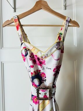 White Floral Midi Dress with Pink Accents and Decorative Belt